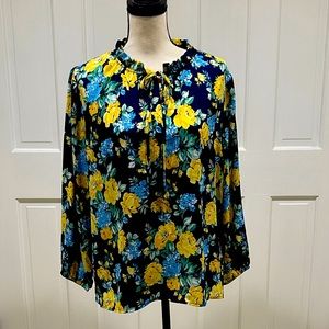 Beautiful floral pattern blouse. Size Large. New with tags.